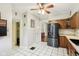Open kitchen with ample cabinet space and stainless-steel refrigerator at 4169 Central Ave, Indianapolis, IN 46205