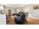 Relaxing living room with hardwood floors, plush furniture, and a decorative area rug at 4169 Central Ave, Indianapolis, IN 46205