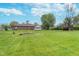Sprawling backyard featuring a garden and shed in a peaceful setting at 417 W Ash St, Jamestown, IN 46147