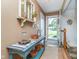 Welcoming foyer featuring a charming decor and a glimpse of the bright outdoors at 417 W Ash St, Jamestown, IN 46147