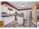 Modern kitchen features stainless steel appliances, center island, and ample counter space at 417 W Ash St, Jamestown, IN 46147