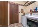 A laundry room with white front load machines and neutral-toned walls at 417 W Ash St, Jamestown, IN 46147