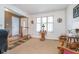 Cozy room with classic decor, plush carpet, and a large window at 417 W Ash St, Jamestown, IN 46147