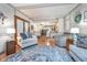 Open-concept living area with hardwood floors and seamless flow to the kitchen and dining space at 417 W Ash St, Jamestown, IN 46147