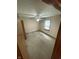 Bedroom with neutral carpet, a ceiling fan and good light from the windows at 4611 29Th St, Columbus, IN 47203
