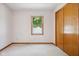 Cozy bedroom features a window with natural light and closet for ample storage at 4611 29Th St, Columbus, IN 47203
