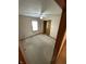 This bedroom is carpeted and features a ceiling fan and closet at 4611 29Th St, Columbus, IN 47203
