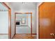 View from foyer into spacious living room with fireplace and lots of natural light at 4611 29Th St, Columbus, IN 47203