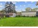 Spacious backyard featuring a shed and a mix of fenced in and unfenced yard at 4864 N Katherine Dr, Indianapolis, IN 46226