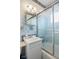 Cozy bathroom featuring a shower-tub combo with sliding glass doors at 4864 N Katherine Dr, Indianapolis, IN 46226