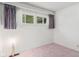 Bright bedroom with large window and neutral-colored walls, filled with natural light at 4864 N Katherine Dr, Indianapolis, IN 46226