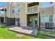 Private back patio with an outdoor seating area and multiple levels of balconies at 5177 Fairway Dr, Avon, IN 46123
