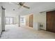 Basement with neutral carpet, doors, freezer, and fan at 5177 Fairway Dr, Avon, IN 46123