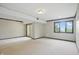 Basement with neutral carpet and view to outdoors at 5177 Fairway Dr, Avon, IN 46123