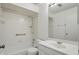 Bathroom featuring a shower-tub combination and a large sink at 5177 Fairway Dr, Avon, IN 46123