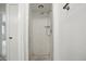 Bathroom shower stall features white tiles and shower head at 5177 Fairway Dr, Avon, IN 46123