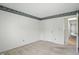 Bedroom with a large window, closet, and neutral carpet at 5177 Fairway Dr, Avon, IN 46123