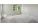 Light-filled bedroom with a bright large window at 5177 Fairway Dr, Avon, IN 46123