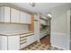Bright breakfast nook with sliding glass doors leading to the backyard and kitchen access at 5177 Fairway Dr, Avon, IN 46123