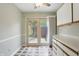 Bright breakfast nook with sliding glass doors leading to the backyard patio at 5177 Fairway Dr, Avon, IN 46123