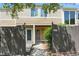 Inviting front exterior featuring a private entrance and cozy, secluded outdoor space with privacy fence at 5177 Fairway Dr, Avon, IN 46123
