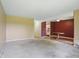 Open living room featuring neutral walls, carpet, and wood floors at 5177 Fairway Dr, Avon, IN 46123