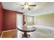 Open floor plan showing the living room, dining room, and access to backyard and the fireplace feature at 5177 Fairway Dr, Avon, IN 46123