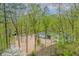 Scenic aerial view of a charming home nestled among lush trees at 5190 Potters Pike, Indianapolis, IN 46234