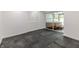 Basement area with interlocking floor tiles features a jacuzzi room, and large closet at 5190 Potters Pike, Indianapolis, IN 46234