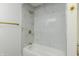 Bright bathroom features a soaking tub and shower with marble tile surround at 5190 Potters Pike, Indianapolis, IN 46234