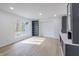 Bonus room with modern finishes, built-in cabinets, and large windows at 5190 Potters Pike, Indianapolis, IN 46234