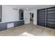 Spacious bonus room with built-in shelves and cabinetry offering plenty of space at 5190 Potters Pike, Indianapolis, IN 46234
