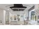 Bright kitchen with stainless steel appliances, white countertops, and a large center island at 5190 Potters Pike, Indianapolis, IN 46234