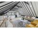 Open concept living room with vaulted ceilings, exposed beams, and modern furnishings at 5190 Potters Pike, Indianapolis, IN 46234