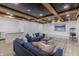 Inviting living room featuring a modern bar, blue couches, and a stylish coffee table at 5190 Potters Pike, Indianapolis, IN 46234