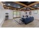 Cozy living room featuring a unique ceiling, sliding doors, and entertainment space at 5190 Potters Pike, Indianapolis, IN 46234
