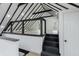 Cozy loft featuring black railing, hardwood floors, neutral paint and bright natural light at 5190 Potters Pike, Indianapolis, IN 46234
