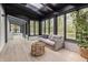 Bright sunroom with skylights and large windows bringing the outdoors in at 5190 Potters Pike, Indianapolis, IN 46234