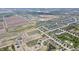 Aerial view of a residential development featuring ponds, green spaces, and single-Gathering homes at 5204 Cartland Dr, Indianapolis, IN 46239