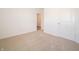 Bright, empty bedroom features neutral carpeting and white walls, providing a blank canvas to create a peaceful space at 5204 Cartland Dr, Indianapolis, IN 46239