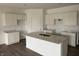 Modern kitchen with large island, granite countertops, stainless sink, and plenty of cabinet space at 5204 Cartland Dr, Indianapolis, IN 46239