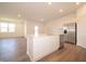 Open-concept kitchen island flows into the living area with stainless steel appliances at 5204 Cartland Dr, Indianapolis, IN 46239