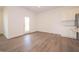 Well-lit living area features light hardwood floors and an open floor plan at 5204 Cartland Dr, Indianapolis, IN 46239