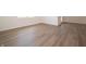 Open living space with laminate flooring, light walls, and natural light at 5204 Cartland Dr, Indianapolis, IN 46239