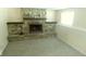Cozy room featuring a stone fireplace, carpeting and a window at 5415 Wagon Wheel Trl, Indianapolis, IN 46237