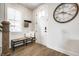 Welcoming entryway featuring a bench with pillows, coat rack, and modern decor at 544 N Beville Ave, Indianapolis, IN 46201