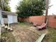 Small brick patio features a shed and outdoor seating, offering a peaceful spot to relax at 5450 E 18Th St, Indianapolis, IN 46218