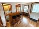 Entertaining space featuring a built-in bar with stools and easy access to the kitchen at 5450 E 18Th St, Indianapolis, IN 46218