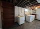 Functional basement laundry area with modern washer and dryer at 5450 E 18Th St, Indianapolis, IN 46218