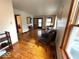 Bright living room showcasing hardwood floors, a neutral color scheme, and natural light at 5450 E 18Th St, Indianapolis, IN 46218